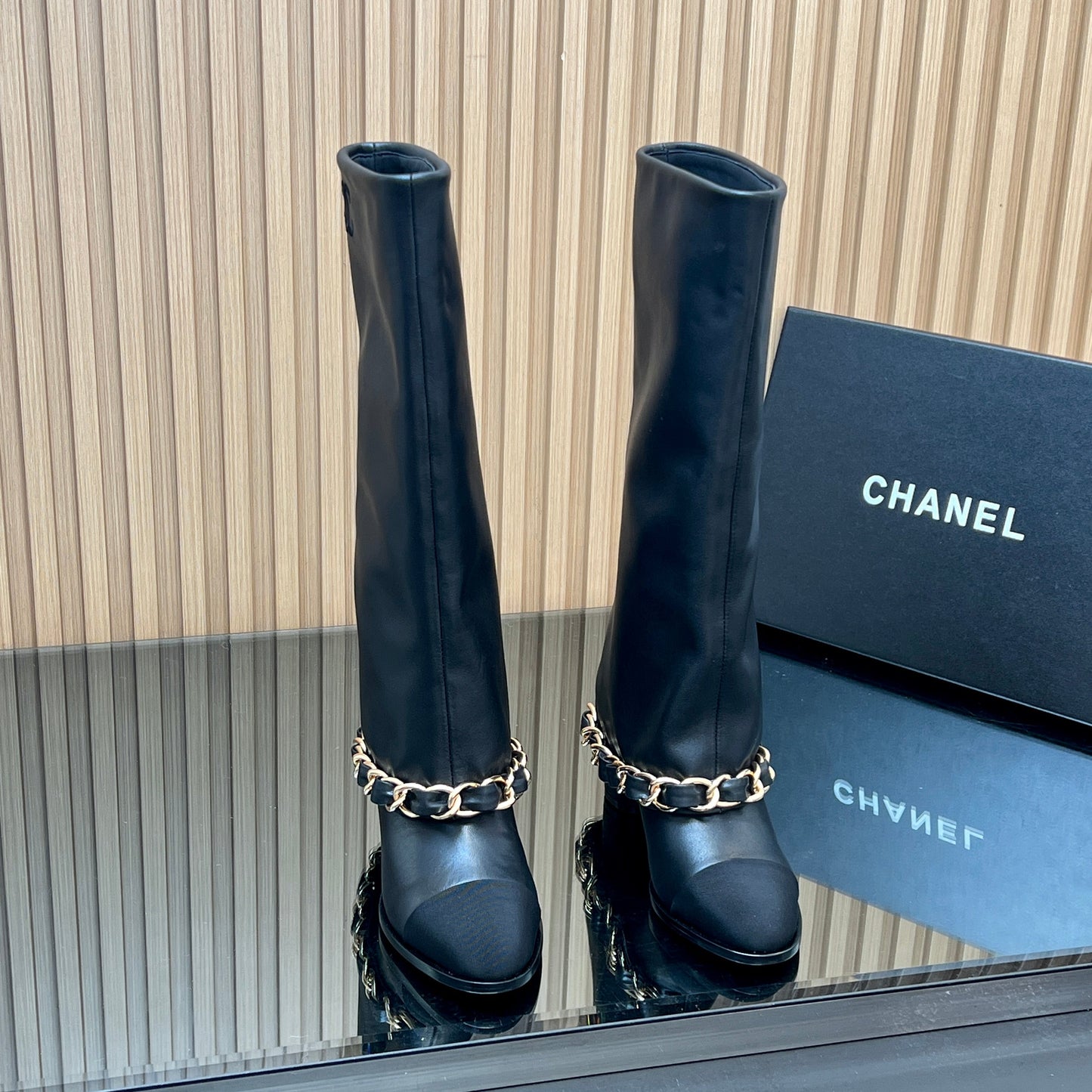 CHANEL 25S KNEE-HIGH HEELED BOOTS 65MM IN BLACK CALFSKIN GOLD HARDWARE