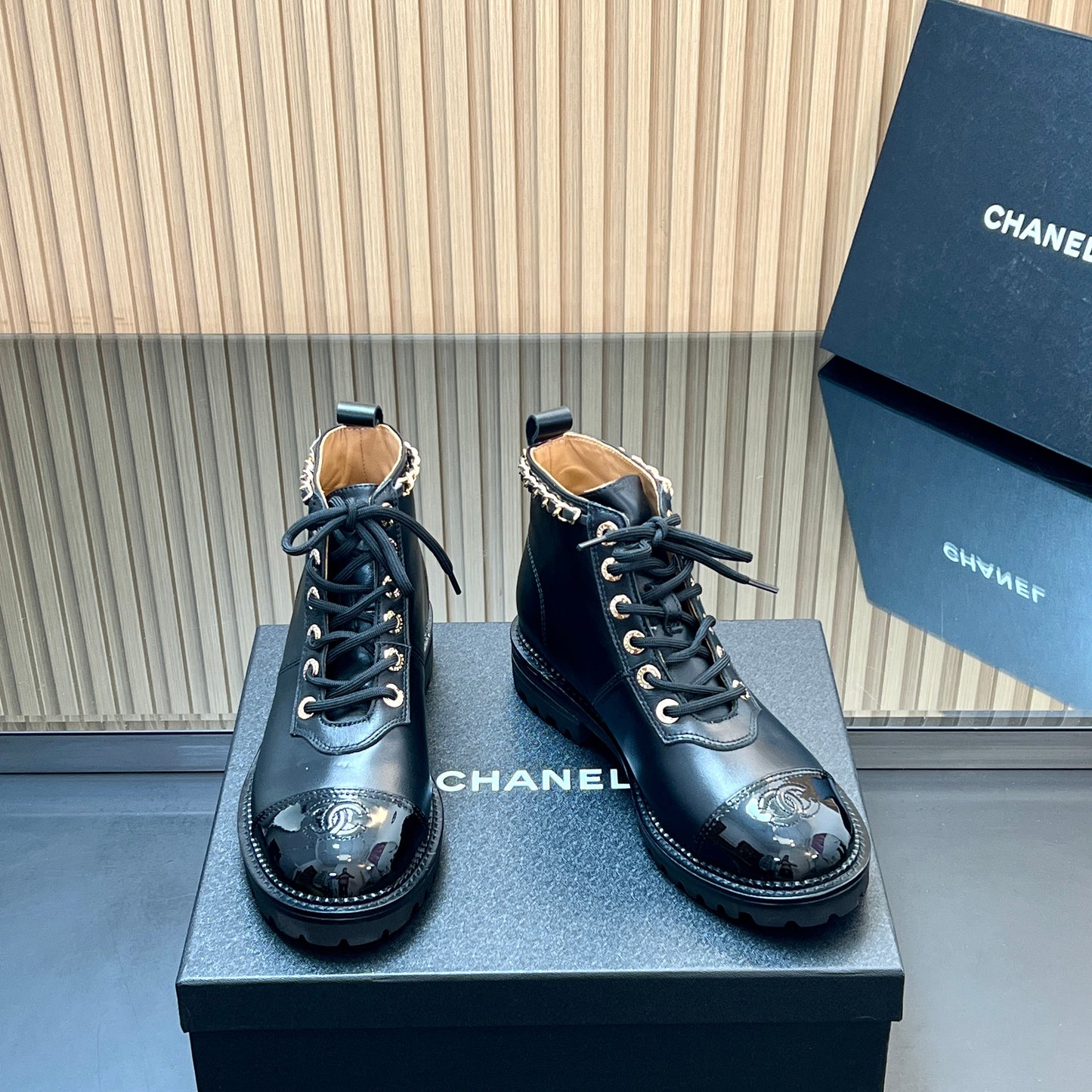 CHANEL 25S MARTIN LACE-UP BOOTS WITH CHAIN DETAIL IN BLACK CALFSKIN - 35