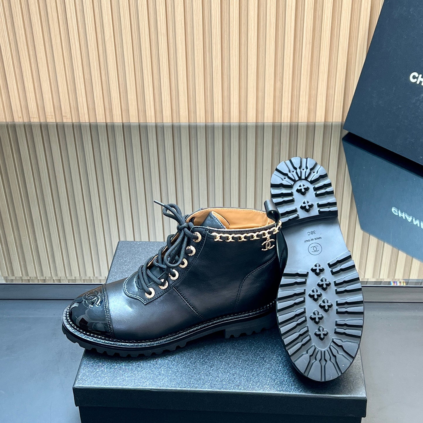 CHANEL 25S MARTIN LACE-UP BOOTS WITH CHAIN DETAIL IN BLACK CALFSKIN - 35