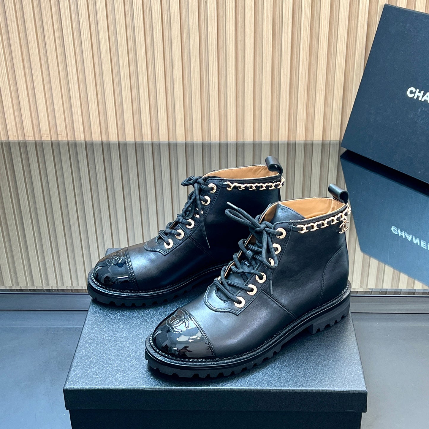 CHANEL 25S MARTIN LACE-UP BOOTS WITH CHAIN DETAIL IN BLACK CALFSKIN - 35