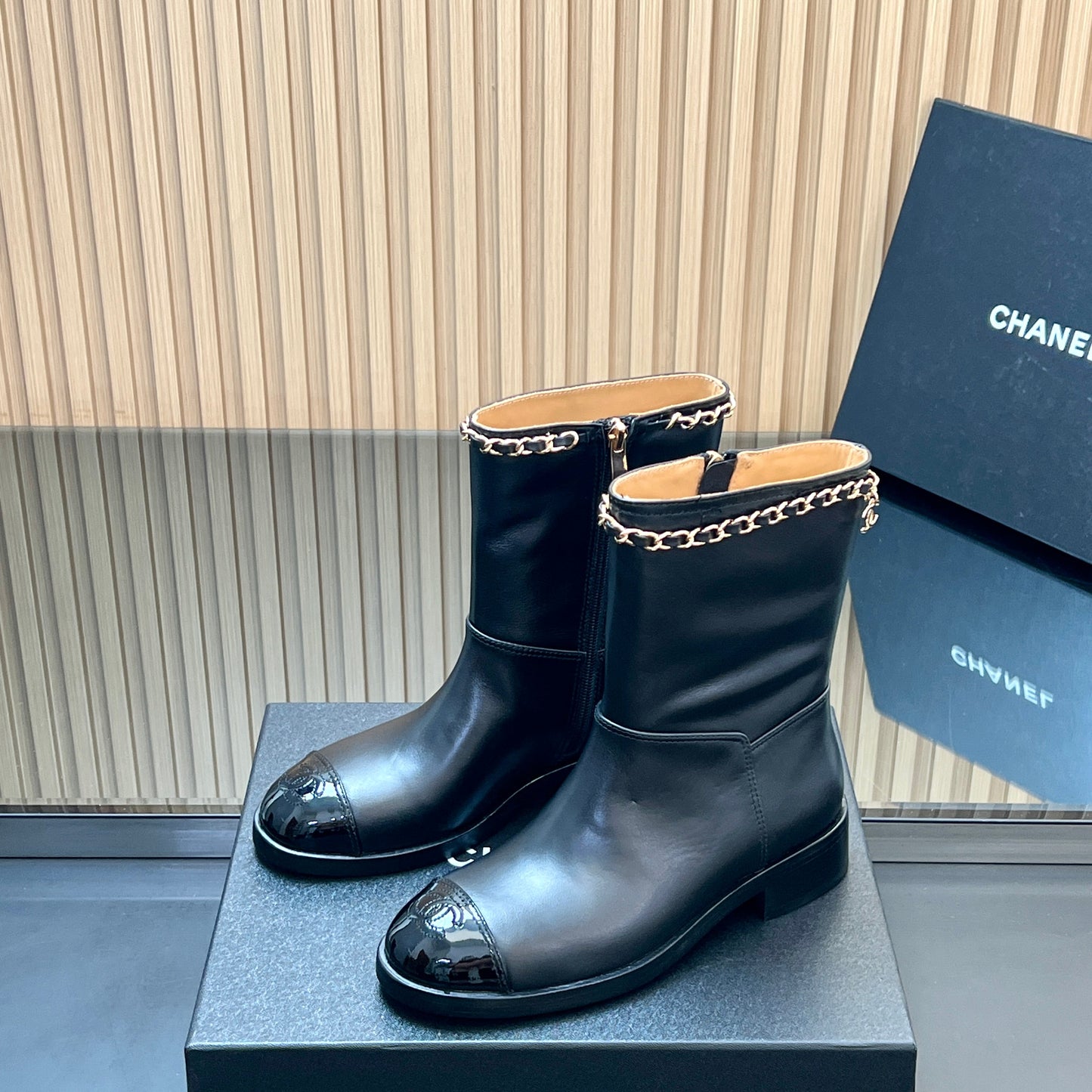 CHANEL 25S SHORT BOOTS WITH CHAIN IN BLACK CALFSKIN - 35