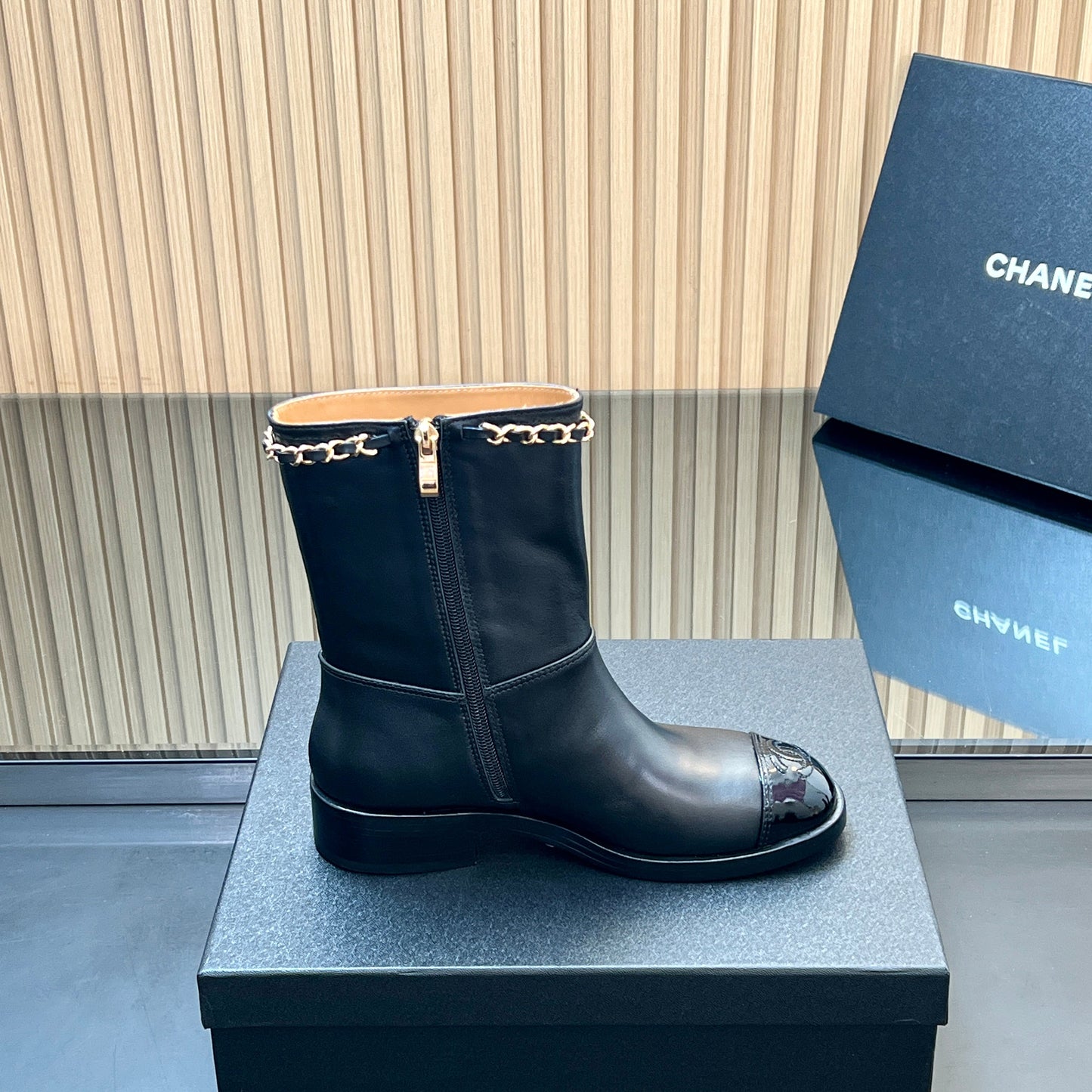 CHANEL 25S SHORT BOOTS WITH CHAIN IN BLACK CALFSKIN - 35
