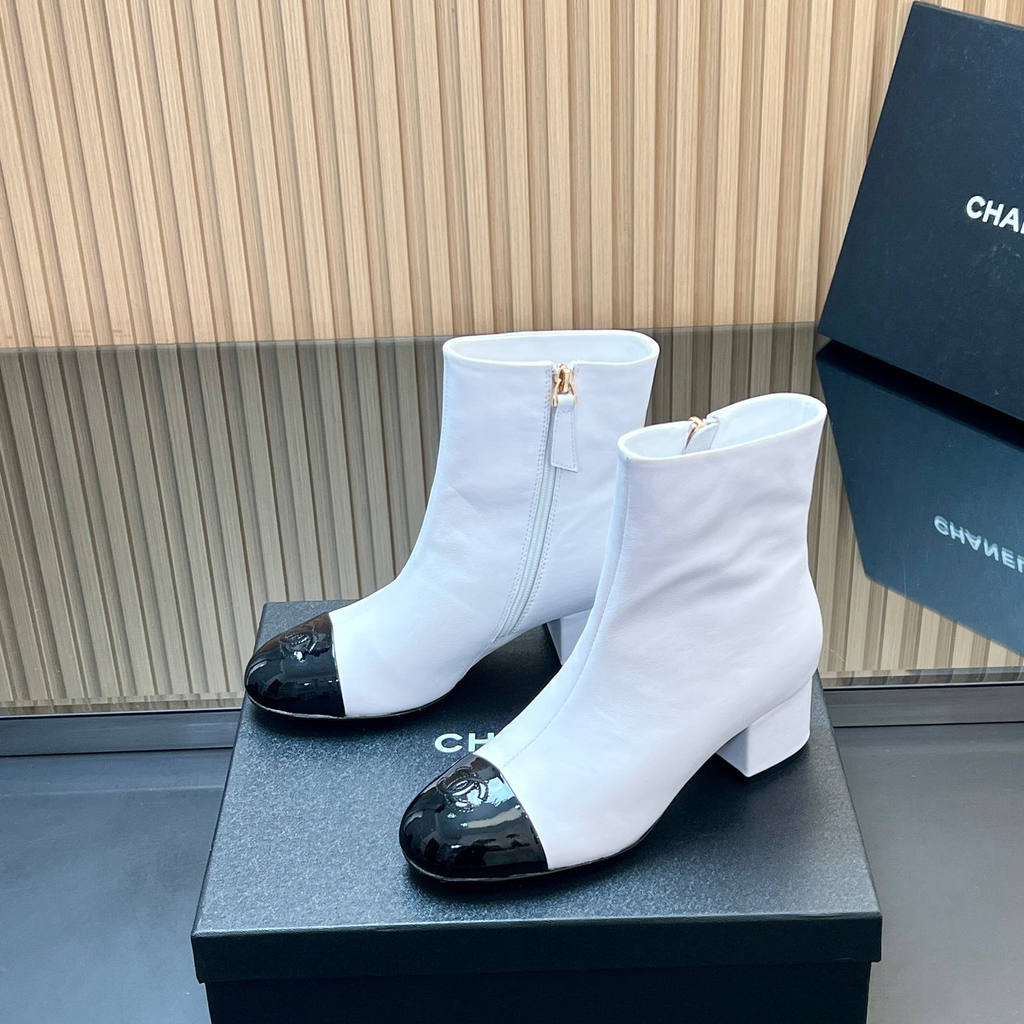 CHANEL 25S BOOTS WITH PATENT TOE CAP 50MM IN WHITE AND BLACK CALFSKIN - 35