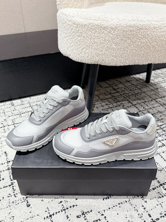 PRADA 25S MEN SNEAKERS IN GRAY AND WHITE CANVAS - 38
