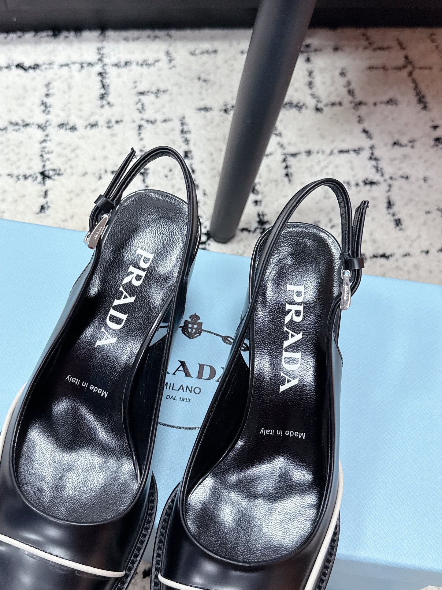 PRADA 26S SLINGBACK PUMPS 70MM IN BLACK SHINY CALFSKIN