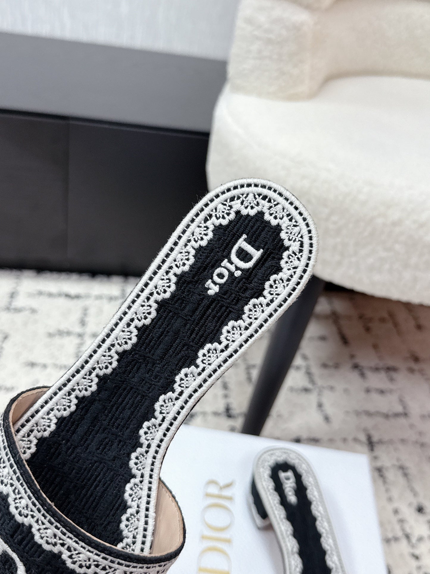 DIOR 26S HIGH HEEL SLIDES IN BLACK AND WHITE EMBOSSED OBLIQUE LACE EMBROIDERY