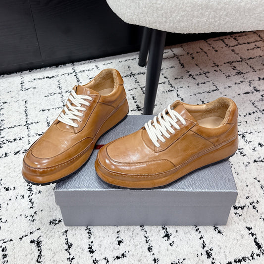 КРОСІВКИ PRADA 26S З БЛИСКУЧОЇ ТЕЛЯЧОЇ ШКІРИ КОЛЬОРУ ЗОЛОТИСТОГО КОРИЧНЕВОГО