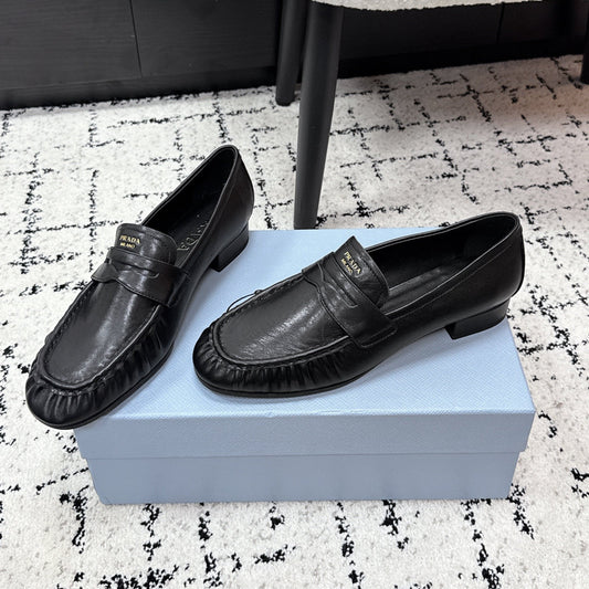 Лофери PRADA 26S 25 мм із чорної телячої шкіри