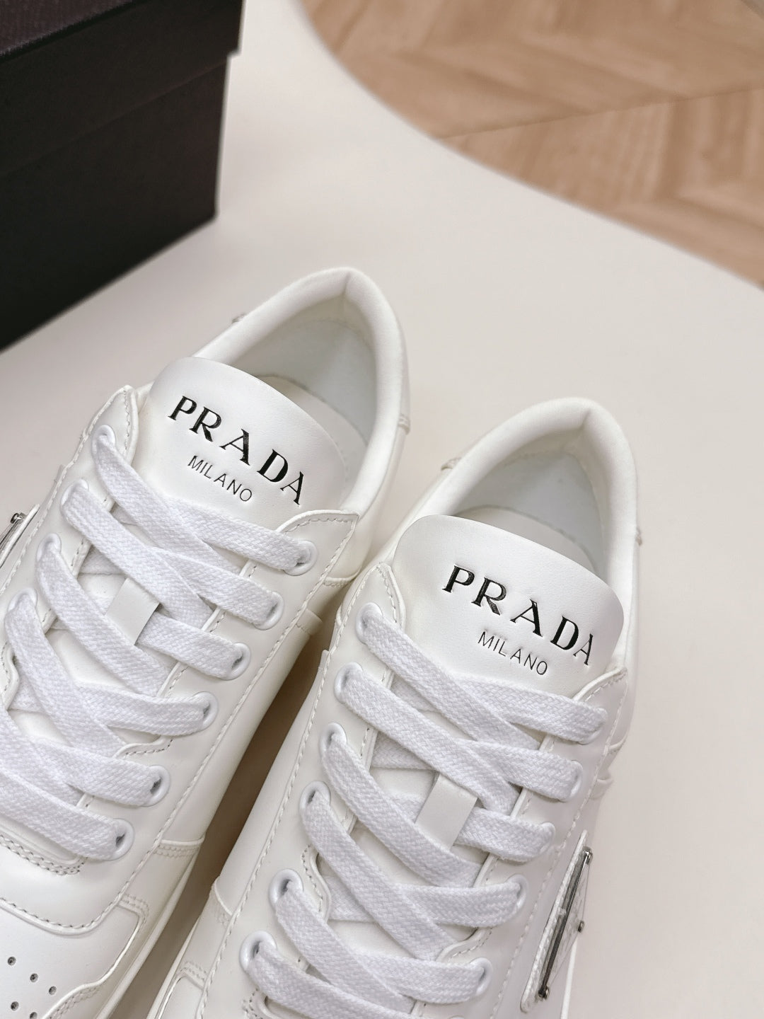 PRADA 25S DOWNTOWN SNEAKERS IN WHITE CALFSKIN SILVER HARDWARE - 35