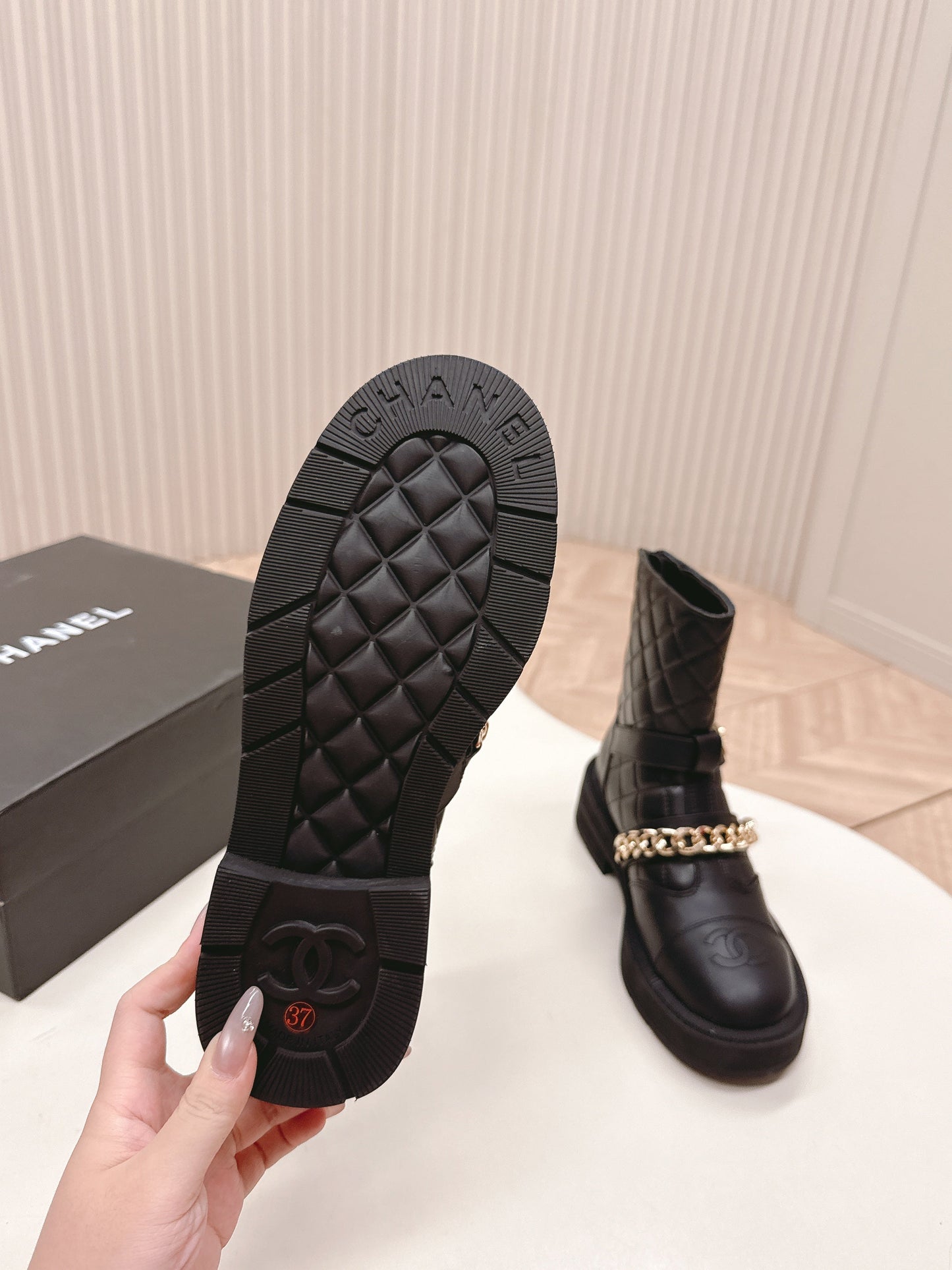 CHANEL ANKLE BOOTS 25S IN BLACK LAMBSKIN EMBOSSED LOGO WITH GOLD HARDWARE - 35