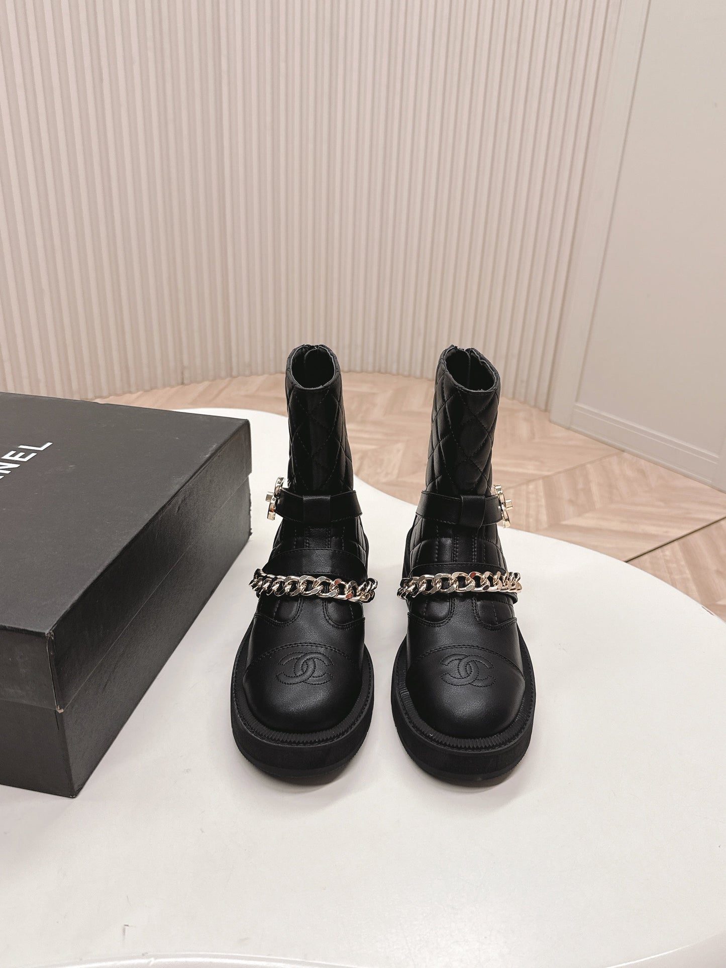 CHANEL ANKLE BOOTS 25S IN BLACK LAMBSKIN EMBOSSED LOGO WITH GOLD HARDWARE - 35
