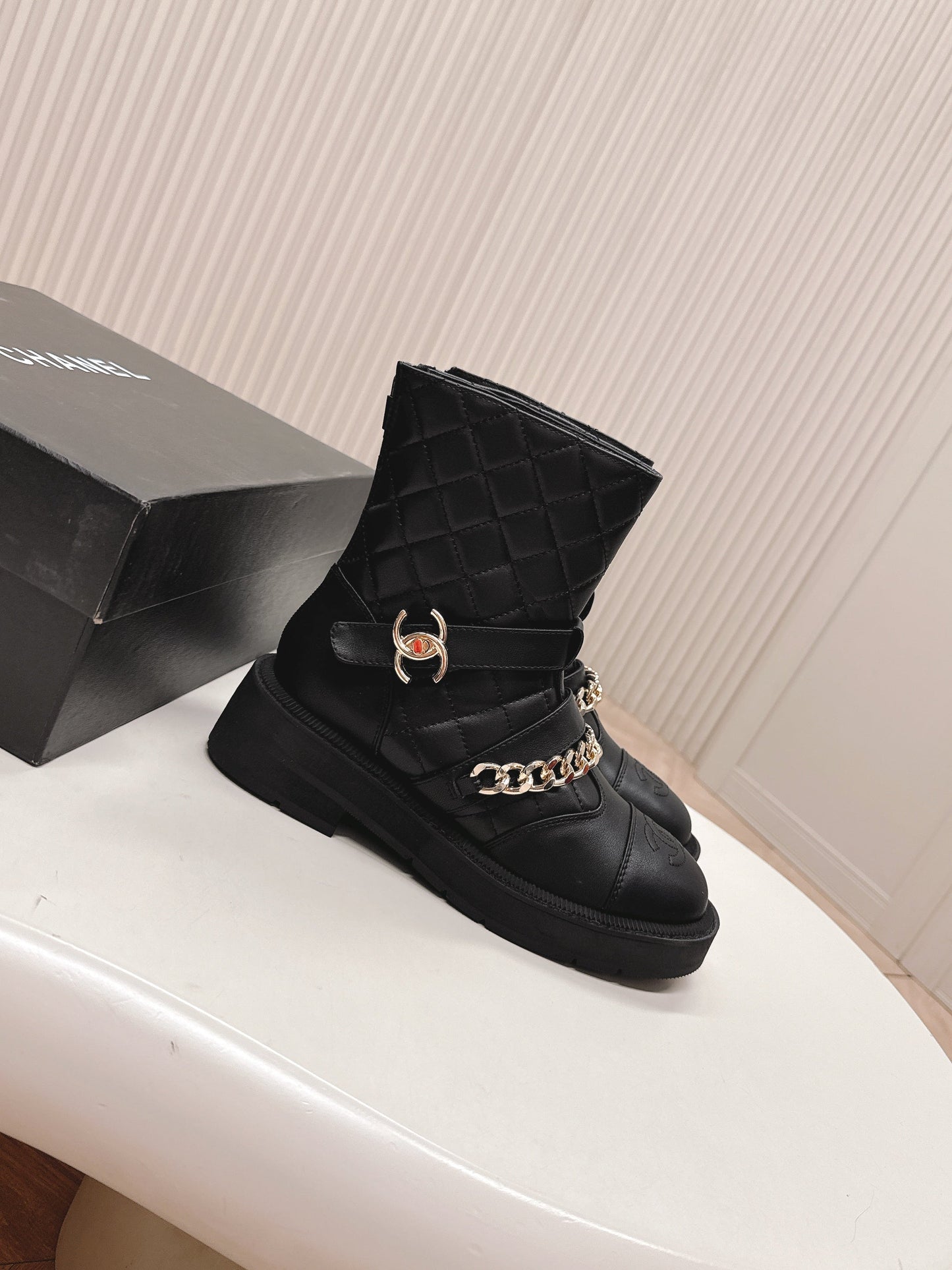 CHANEL ANKLE BOOTS 25S IN BLACK LAMBSKIN EMBOSSED LOGO WITH GOLD HARDWARE - 35