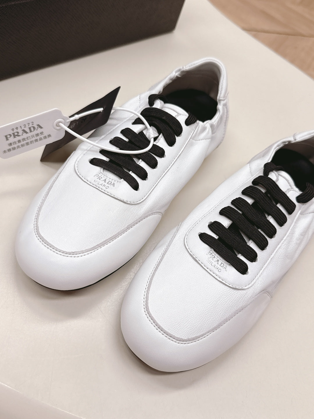 ЖІНОЧІ ТУФЛІ PRADA MARY JANE 26S З БІЛОЇ ТЕЛЯЧОЇ ШКІРИ