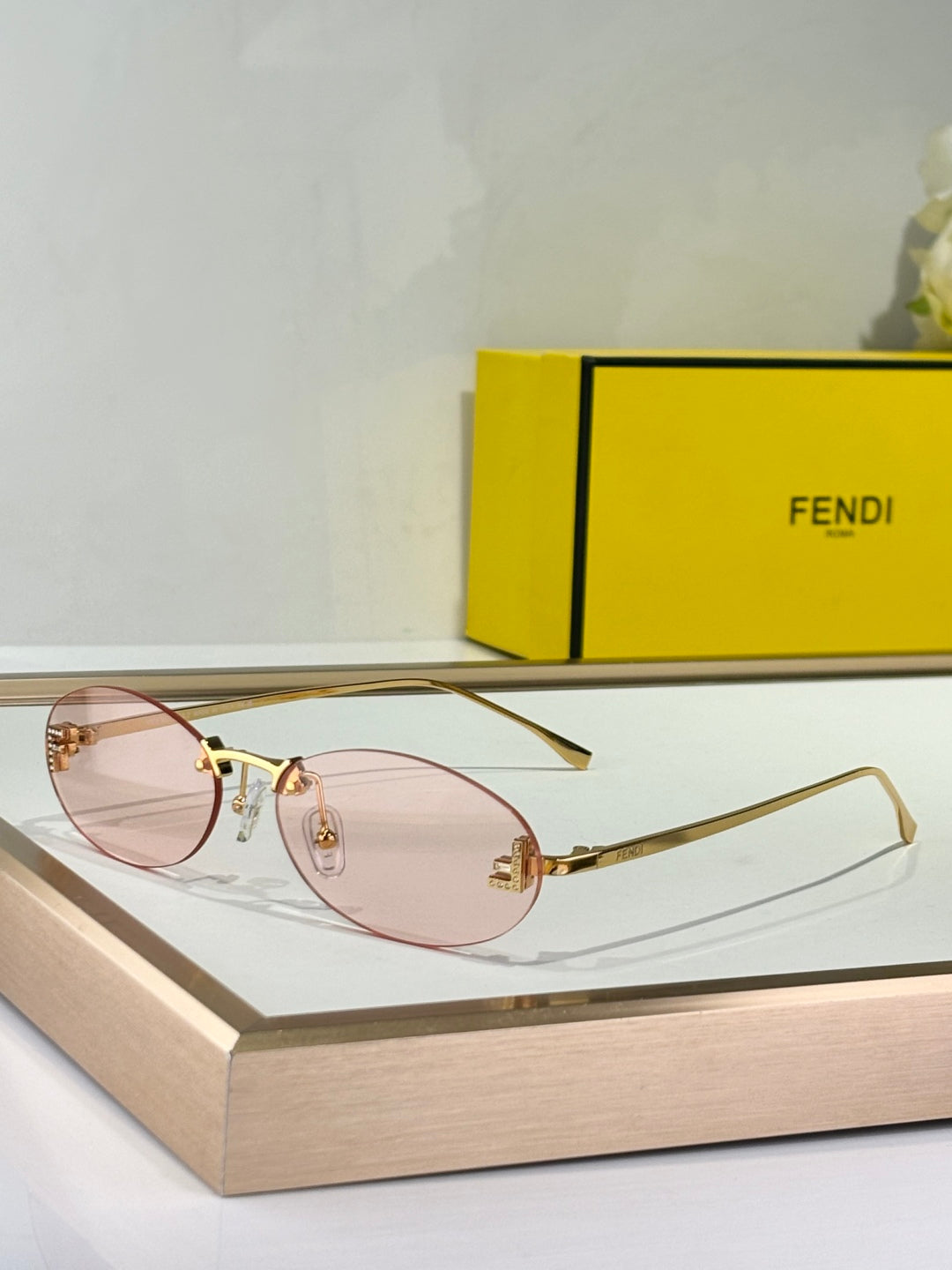 FIRST CRYSTAL RIMLESS OVAL FRAME SUNGLASSES FE4075US IN METAL - Brown