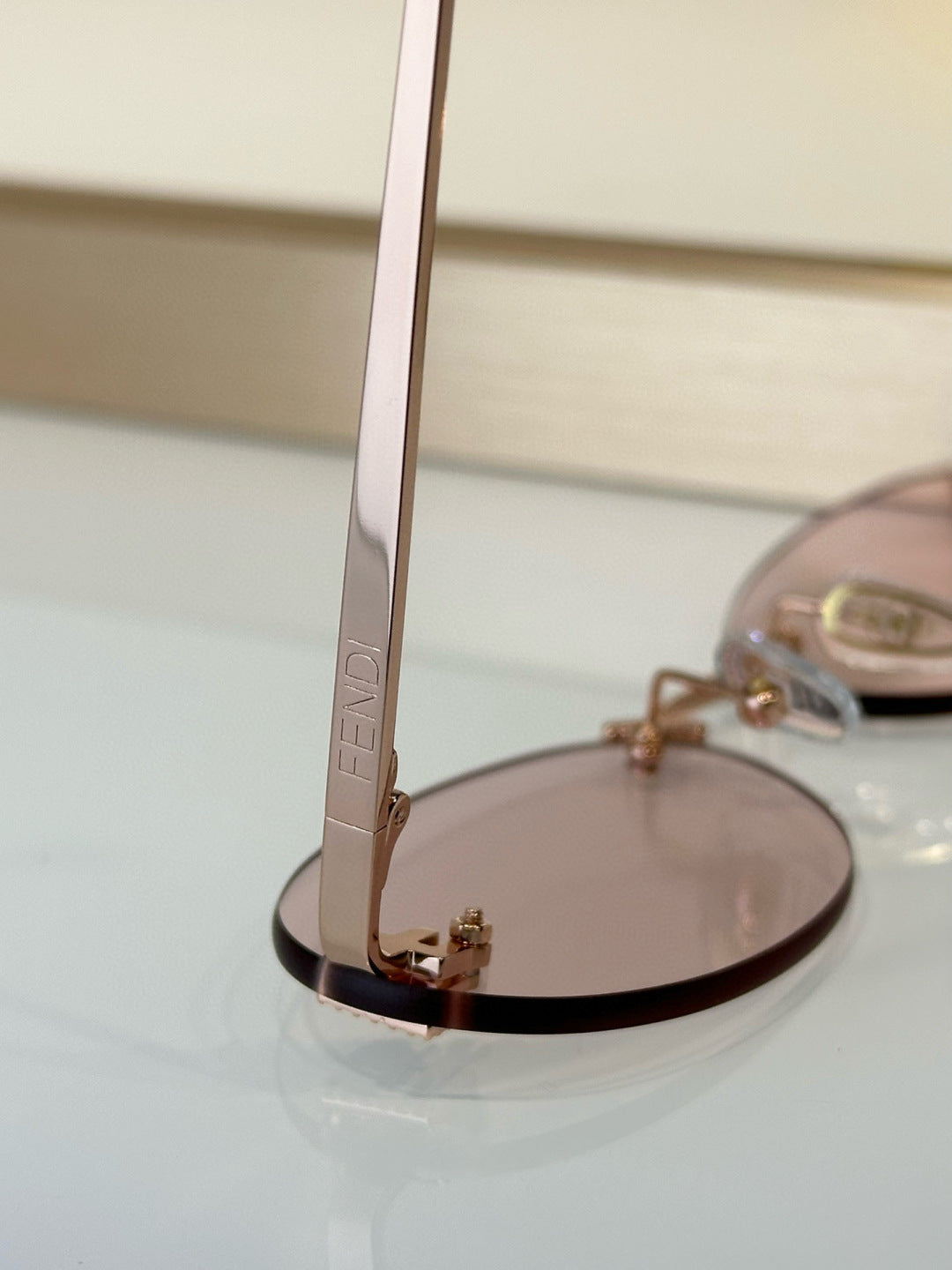 FIRST CRYSTAL RIMLESS OVAL FRAME SUNGLASSES FE4075US IN METAL - Pink