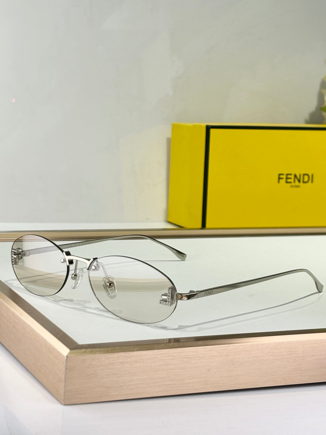 FIRST CRYSTAL RIMLESS OVAL FRAME SUNGLASSES FE4075US IN METAL - Pink