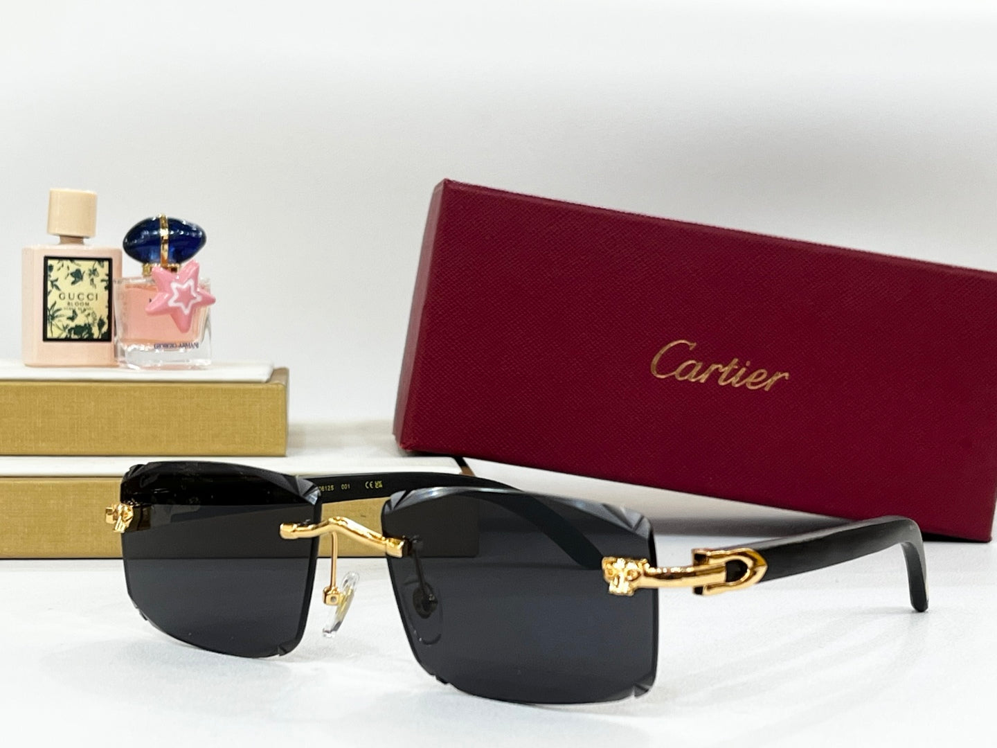 C DE RIMLESS RECTANGULAR FRAME SUNGLASSES CT0612S IN METAL - Grey pink