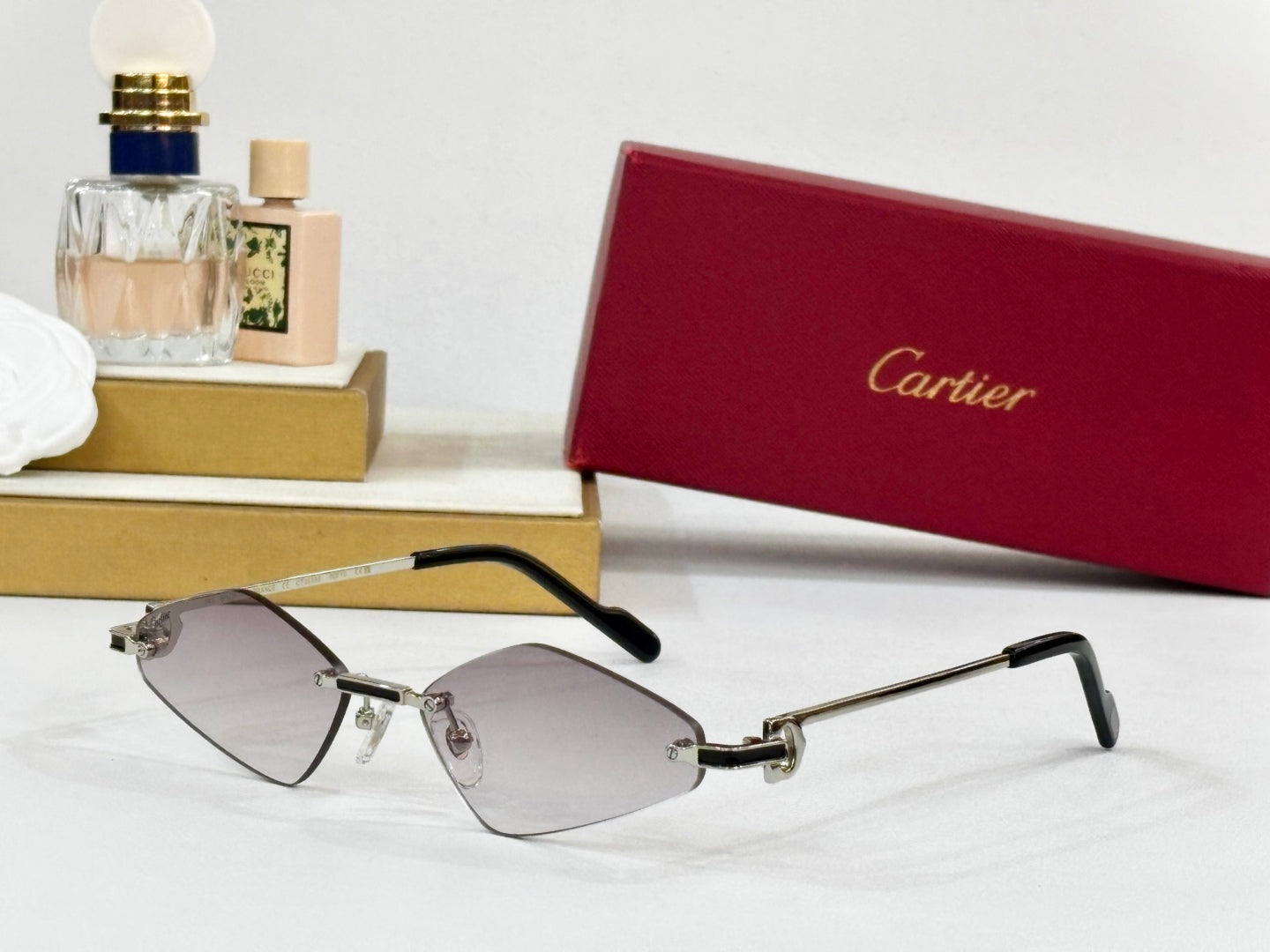 C DE RIMLESS ANGULAR FRAME SUNGLASSES CT0695 IN METAL - Light purple