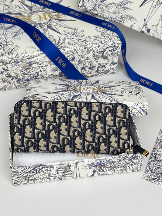ДИЗАЙНЕРСЬКИЙ ГАМАНЕЦЬ DIOR 25S НА БЛИСКАВЦІ, ДОВГИЙ, 19 СМ, СИНІЙ ЖАККАРДОВИЙ ХОЛСТ OBLIQUE