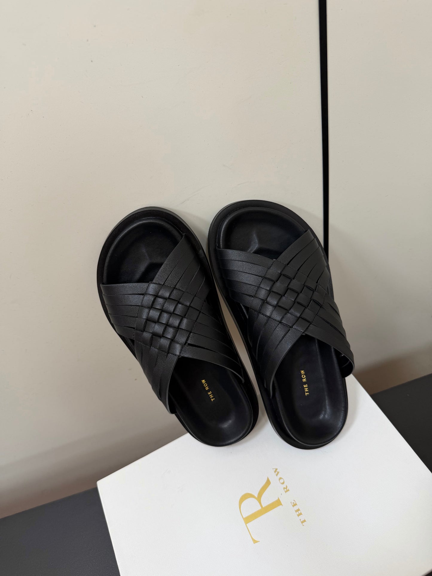 THE ROW 26S CROSS STRAP SANDALS IN BLACK CALFSKIN