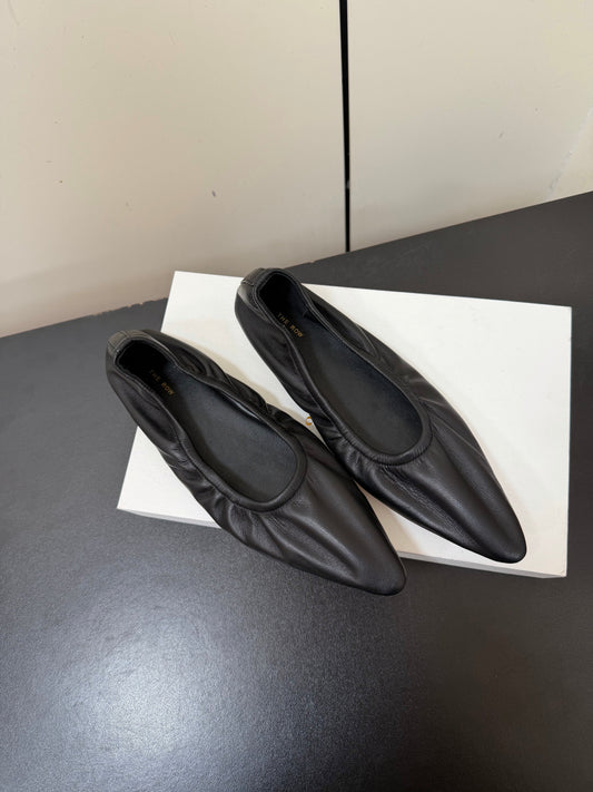 THE ROW 26S POINTED TOE BALLET FLATS IN BLACK LAMBSKIN