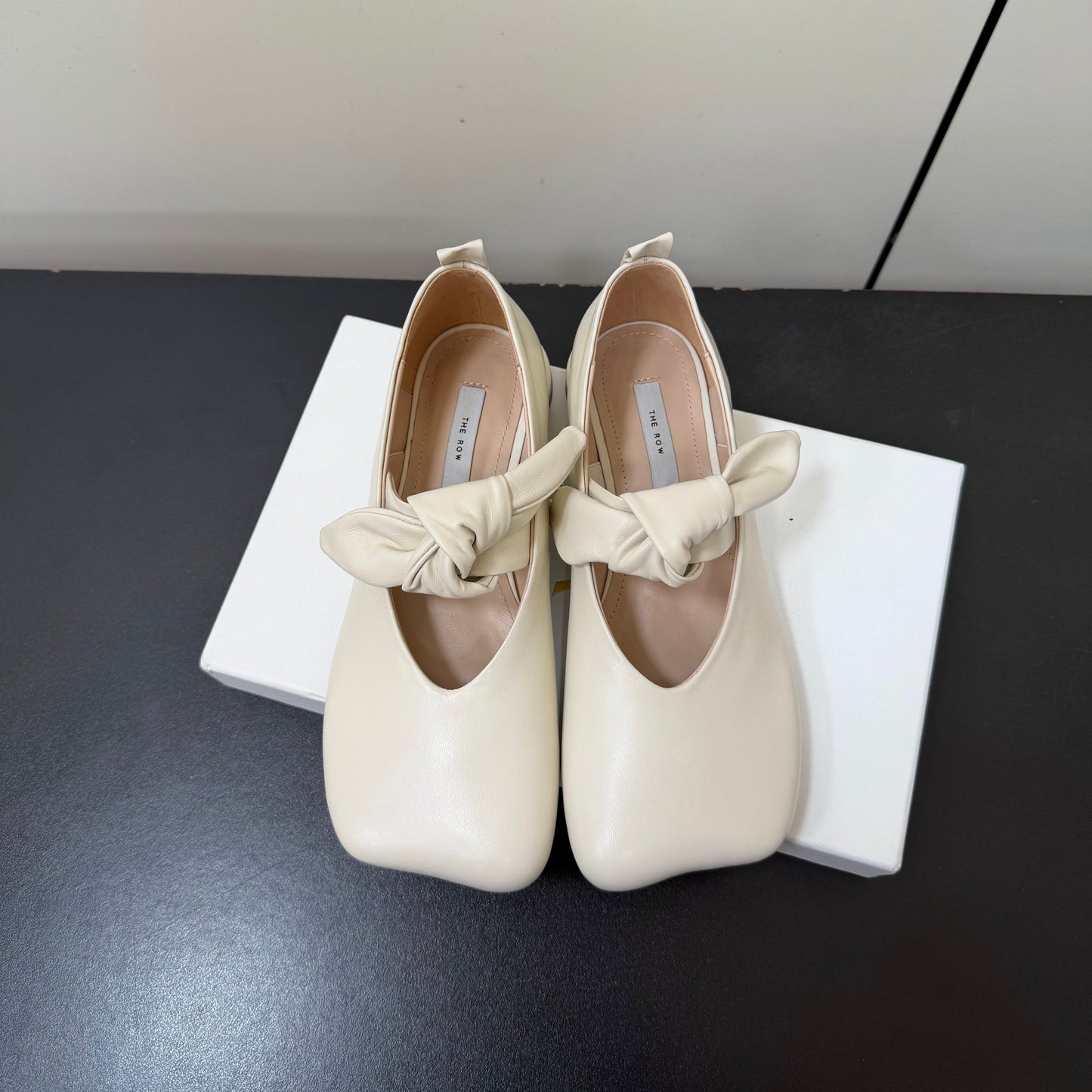 THE ROW 26S BALLET FLATS IN IVORY WHITE KNOT DETAIL CALFSKIN WITH SQUARE TOE