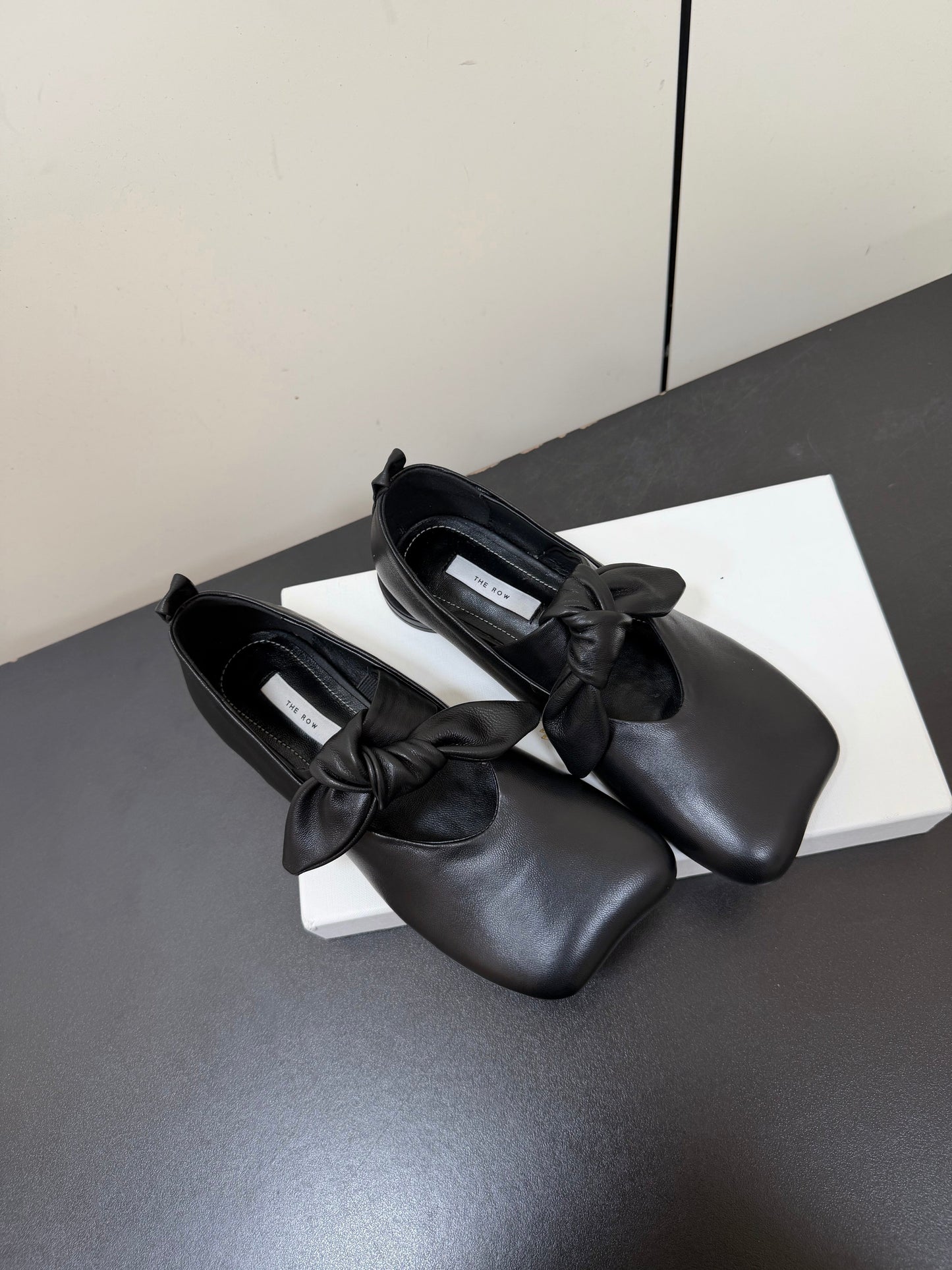 THE ROW 26S BALLET FLATS IN BLACK KNOT DETAIL CALFSKIN WITH SQUARE TOE