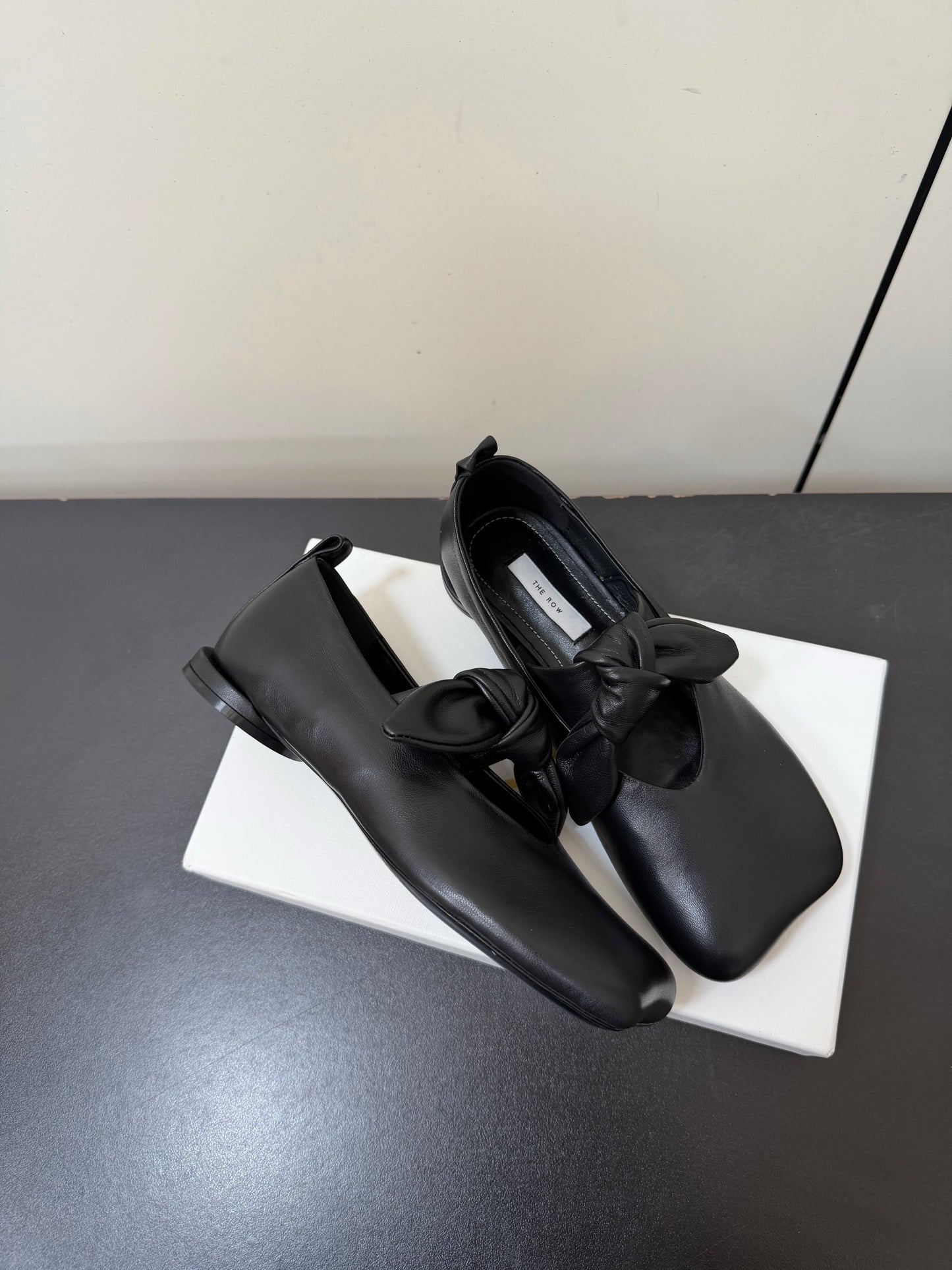 THE ROW 26S BALLET FLATS IN BLACK KNOT DETAIL CALFSKIN WITH SQUARE TOE