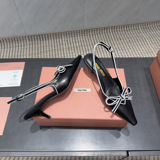 MIUMIU 26S СЛІНГБЕКИ 55 ММ З ЧОРНО-БІЛОЇ ТЕЛЯЧОЇ ШКІРИ З БАНТОМ