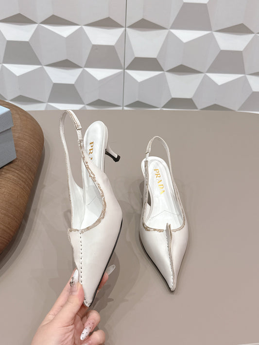 Витончені босоніжки PRADA 26S на підборах 55 мм зі шкіри теляти кремово-білого кольору