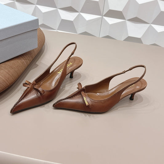 PRADA 26S ГОСТРОНОСІ ТУФЛІ-СЛІНГБЕКИ НА ВИСОКИХ ПІДБОРАХ 55 ММ З КОРИЧНЕВОЇ ТЕЛЯЧОЇ ШКІРИ З БАНТОМ