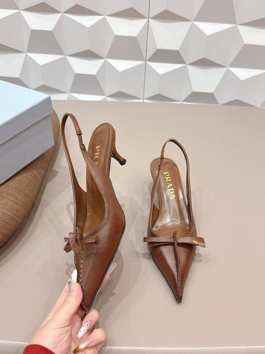 PRADA 26S ГОСТРОНОСІ ТУФЛІ-СЛІНГБЕКИ НА ВИСОКИХ ПІДБОРАХ 55 ММ З КОРИЧНЕВОЇ ТЕЛЯЧОЇ ШКІРИ З БАНТОМ