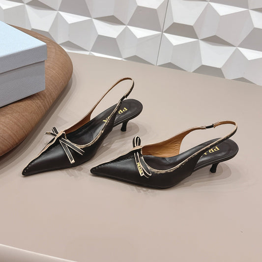 PRADA 26S ГОСТРОНОСІ ТУФЛІ-СЛІНГБЕКИ НА ВИСОКИХ ПІДБОРАХ 55 ММ З ЧОРНОЇ ТЕЛЯЧОЇ ШКІРИ З БАНТОМ