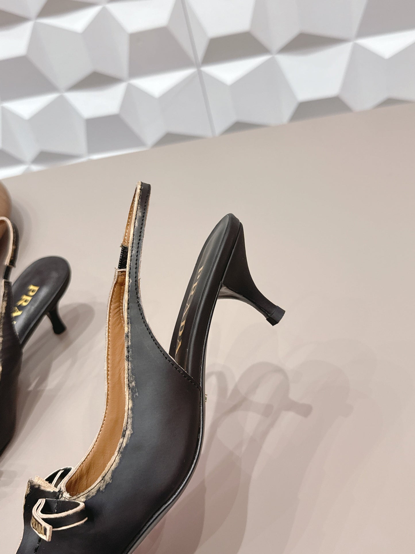 PRADA 26S ГОСТРОНОСІ ТУФЛІ-СЛІНГБЕКИ НА ВИСОКИХ ПІДБОРАХ 55 ММ З ЧОРНОЇ ТЕЛЯЧОЇ ШКІРИ З БАНТОМ