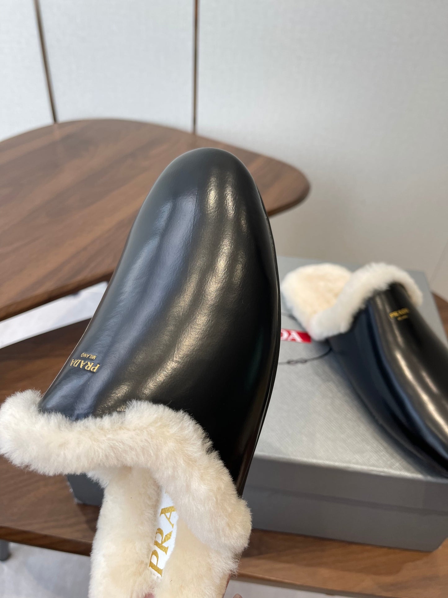 PRADA 25S CLOGS IN BLACK CALFSKIN FUR-LINED - 35