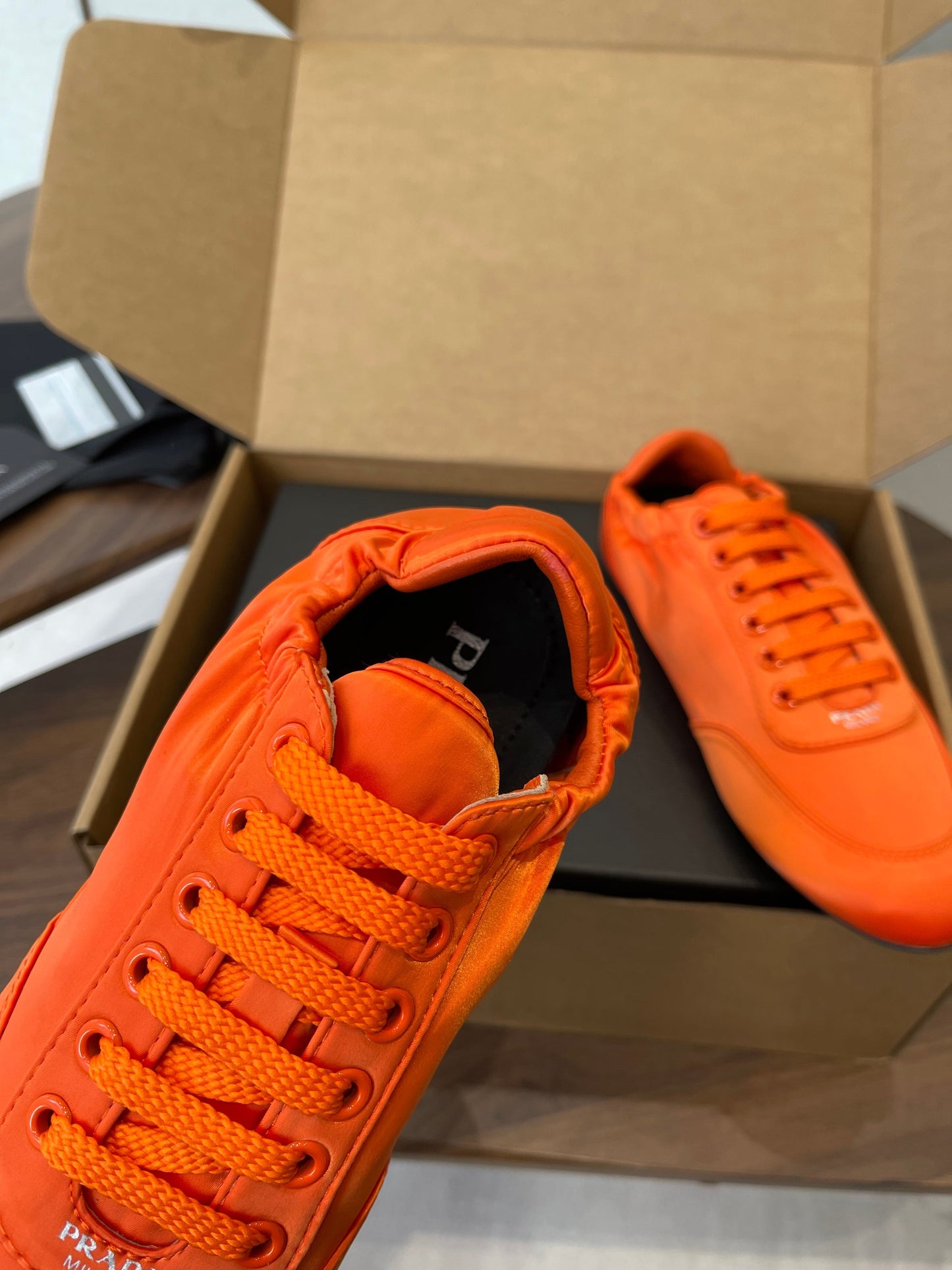 PRADA 25S SNEAKER IN ORANGE SILK - 35