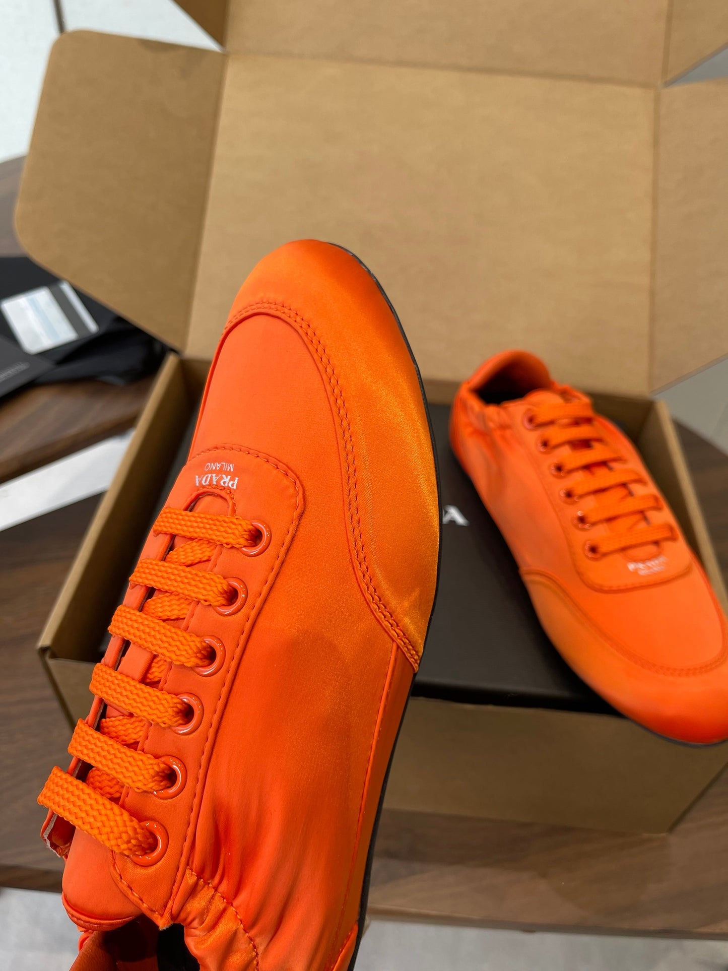 PRADA 25S SNEAKER IN ORANGE SILK - 35