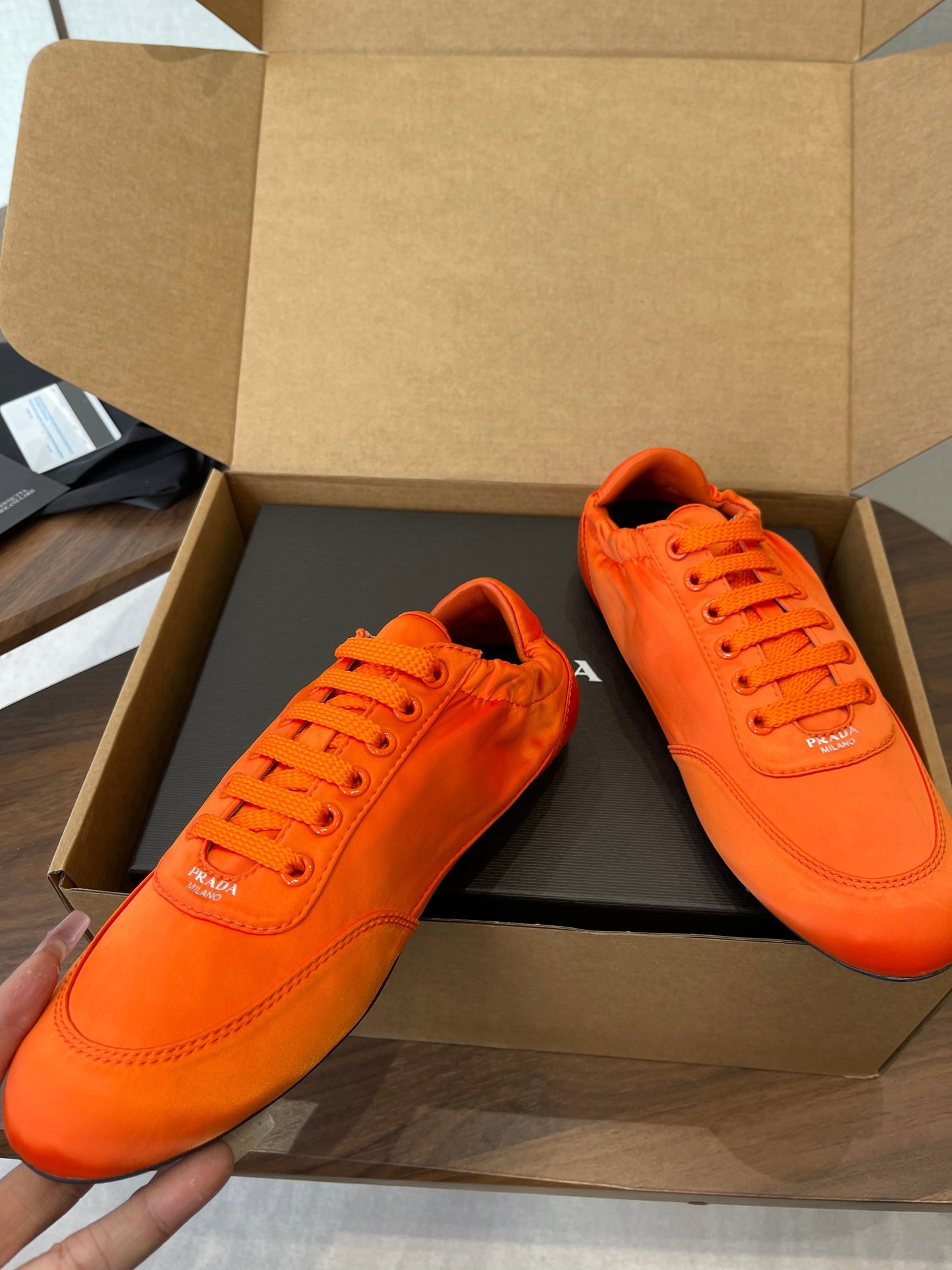 PRADA 25S SNEAKER IN ORANGE SILK - 35
