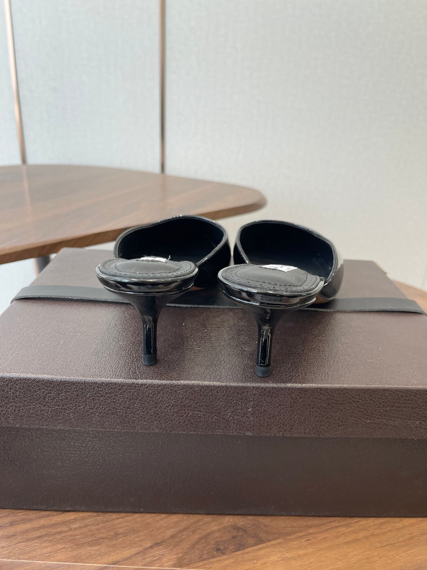 ALAIA 26S HEELED MULES 50 MM IN BLACK GLOSSY CALFSKIN