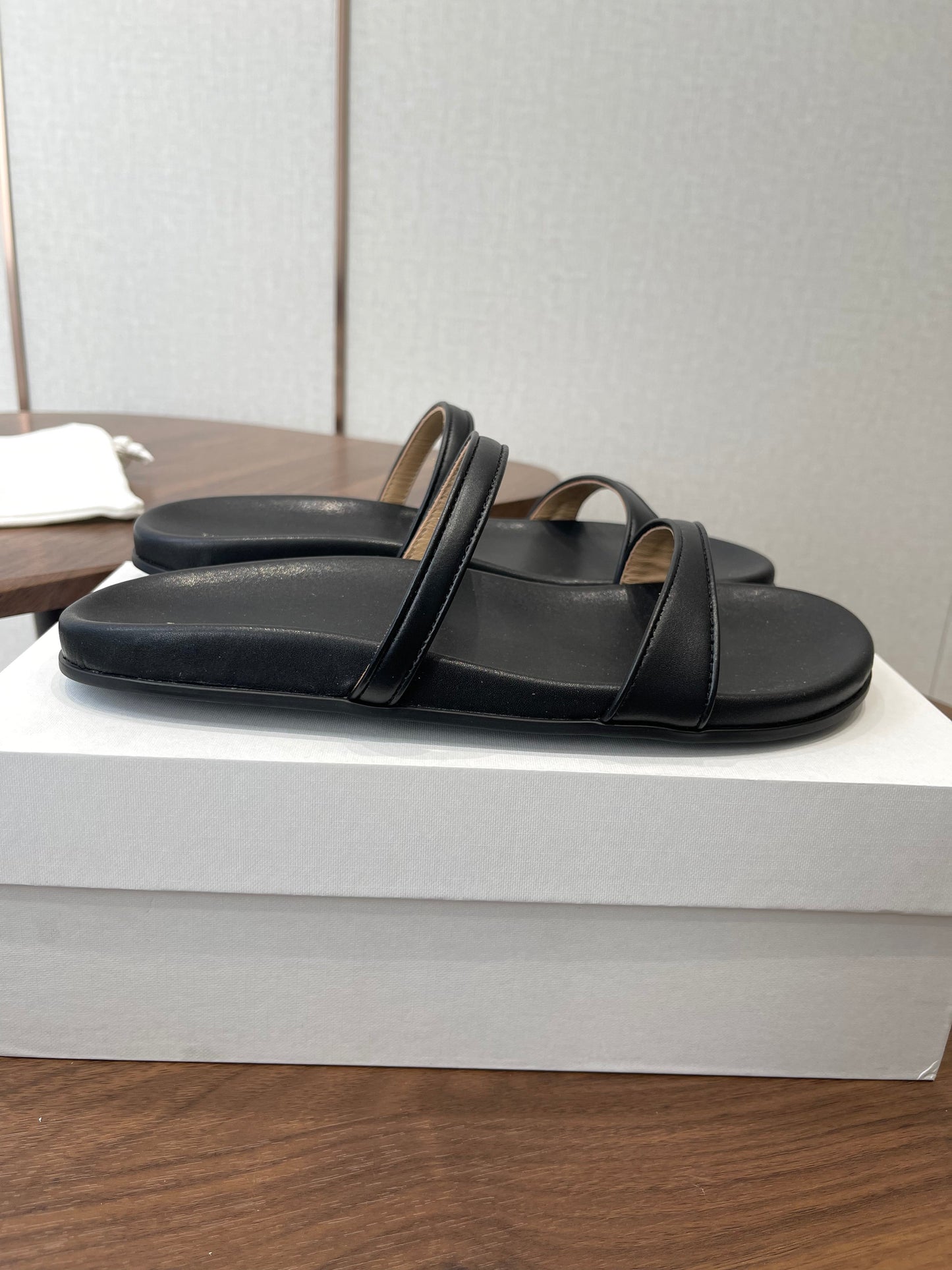 THE ROW 26S DOUBLE STRAP FLAT SANDALS IN BLACK CALFSKIN