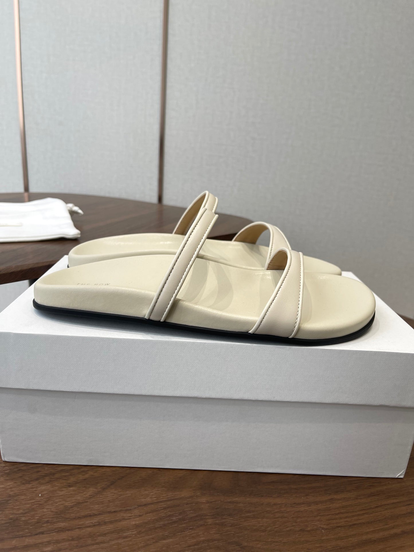 THE ROW 26S DOUBLE STRAP FLAT SANDALS IN IVORY WHITE CALFSKIN