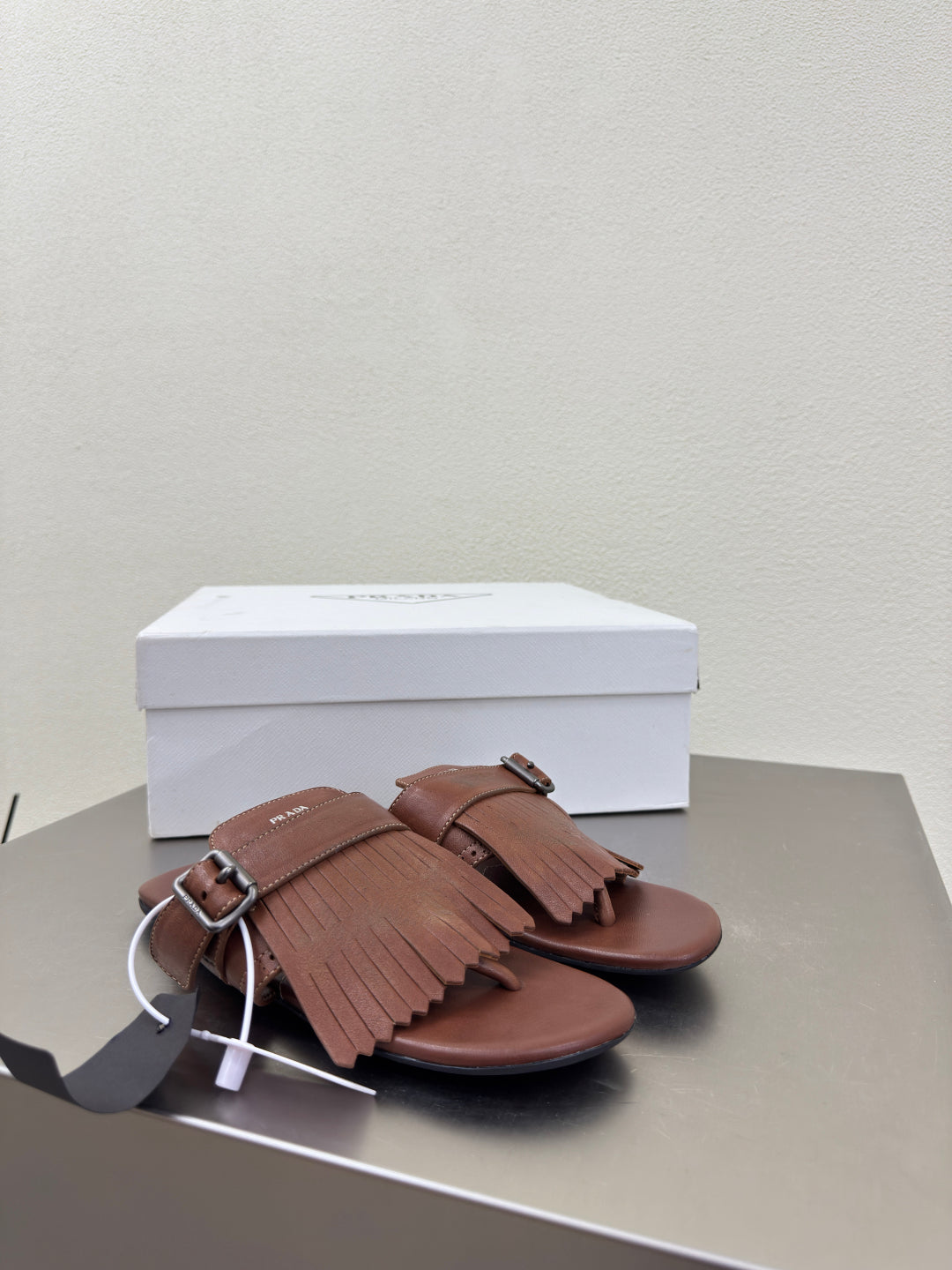 PRADA 25S SHUFFLE LEATHER THONG SANDALS IN SIENNA CALFSKIN - 35