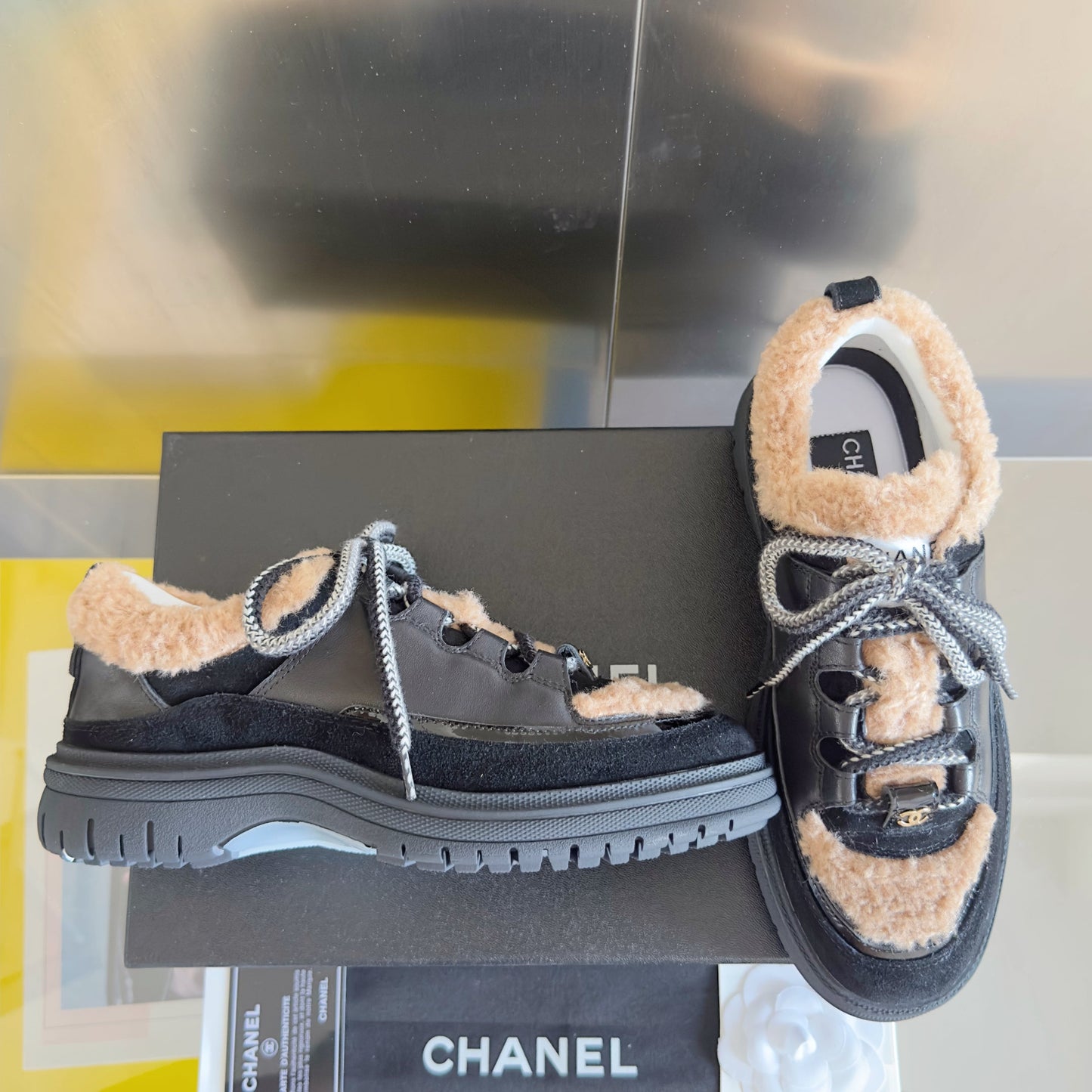 CHANEL 25S SNEAKERS WITH FUR ACCENTS 40MM IN BLACK AND BROWN CALFSKIN - 35