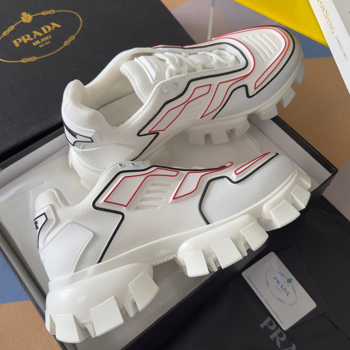 PRADA 26S CLOUDBUST THUNDER SNEAKERS 60MM IN WHITE AND RED MESH FABRIC AND TPU