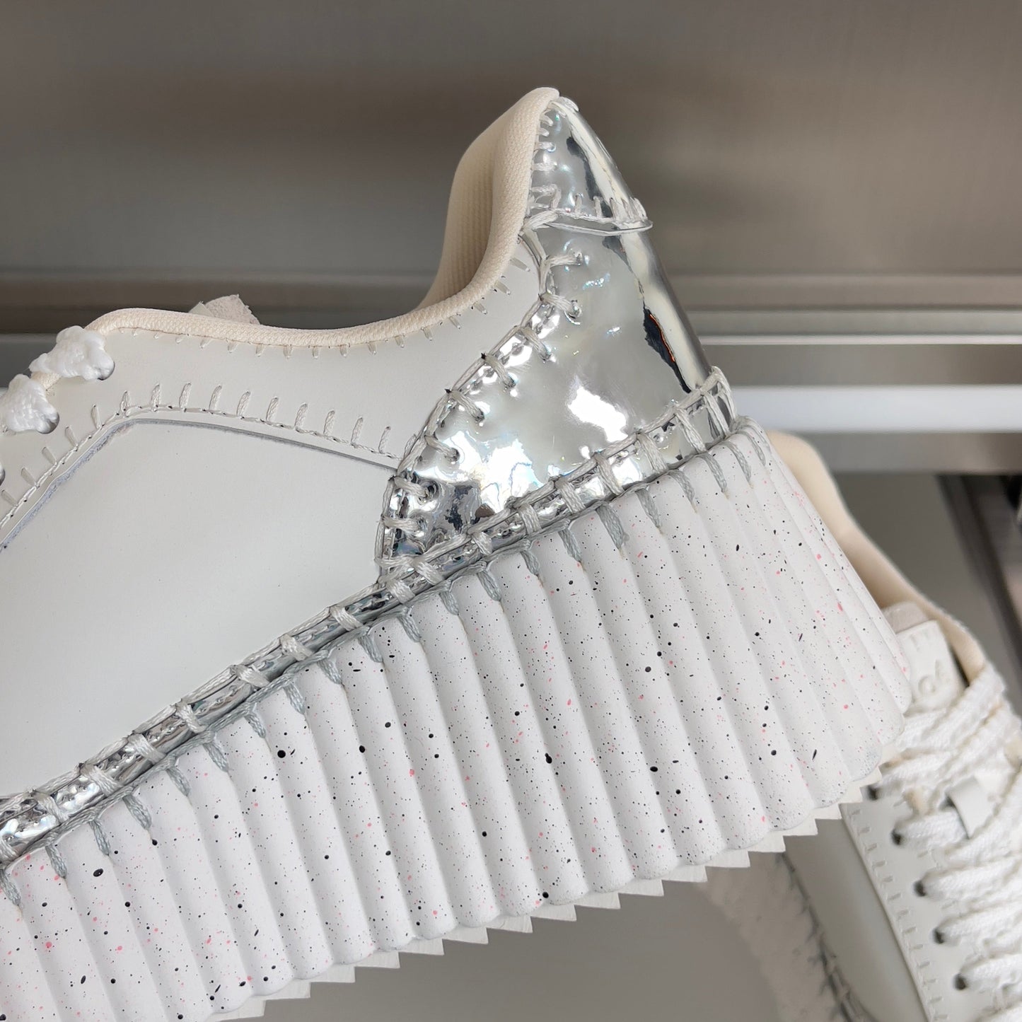 CHLOÉ 26S WEDGE SNEAKERS 70 MM IN WHITE AND SILVER CALFSKIN