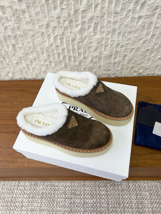 PRADA 25S PLATFORM FUR-LINED MULES IN EARTH BROWN SUEDE - 35