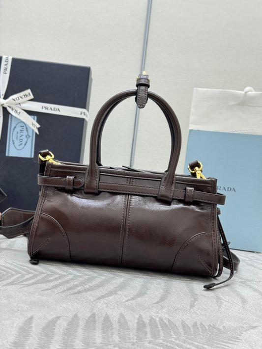 PRADA 25S BONNIE MINI СУМКА 23 З ТЕМНО-КОРИЧНЕВОЇ ТЕЛЯЧОЇ ШКІРИ З ФУРНІТУРОЮ ЗОЛОТОГО КОЛЬОРУ