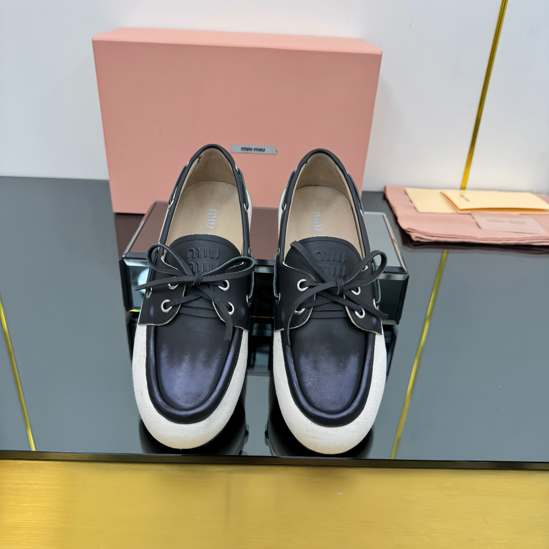 BOAT SHOES IN BLACK CALFSKIN AND WHITE CANVAS - 35