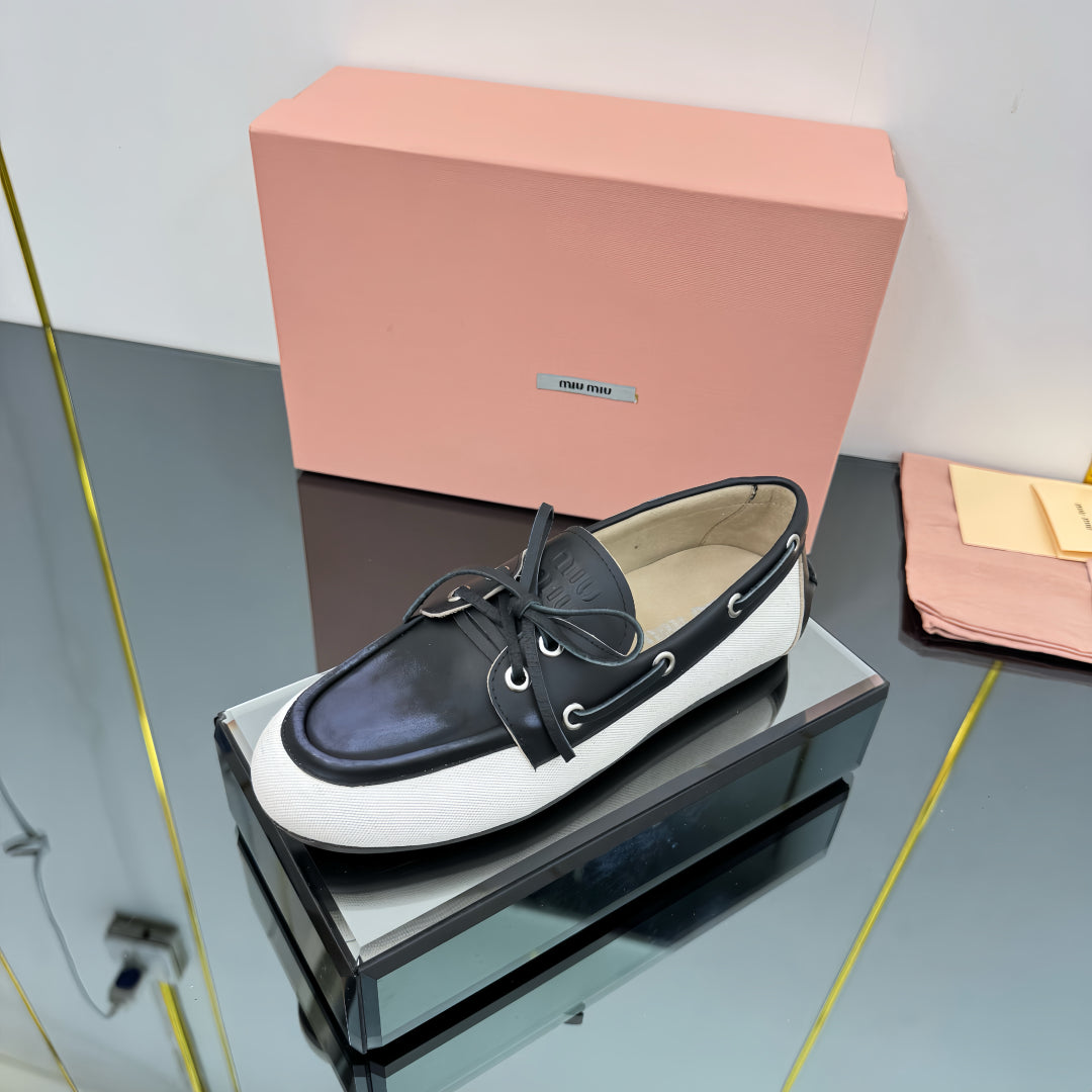 BOAT SHOES IN BLACK CALFSKIN AND WHITE CANVAS - 35