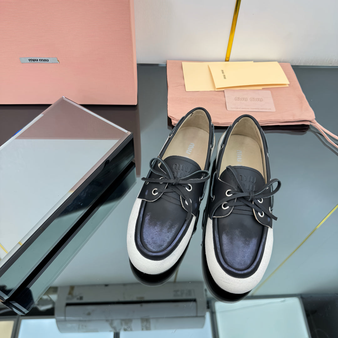 BOAT SHOES IN BLACK CALFSKIN AND WHITE CANVAS - 35
